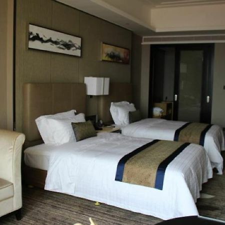 New Beacon Walden Hotel Huanggang  Exterior photo